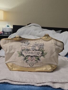 Coach Cream Canvas Tote with Gold Accents and Floral Crest